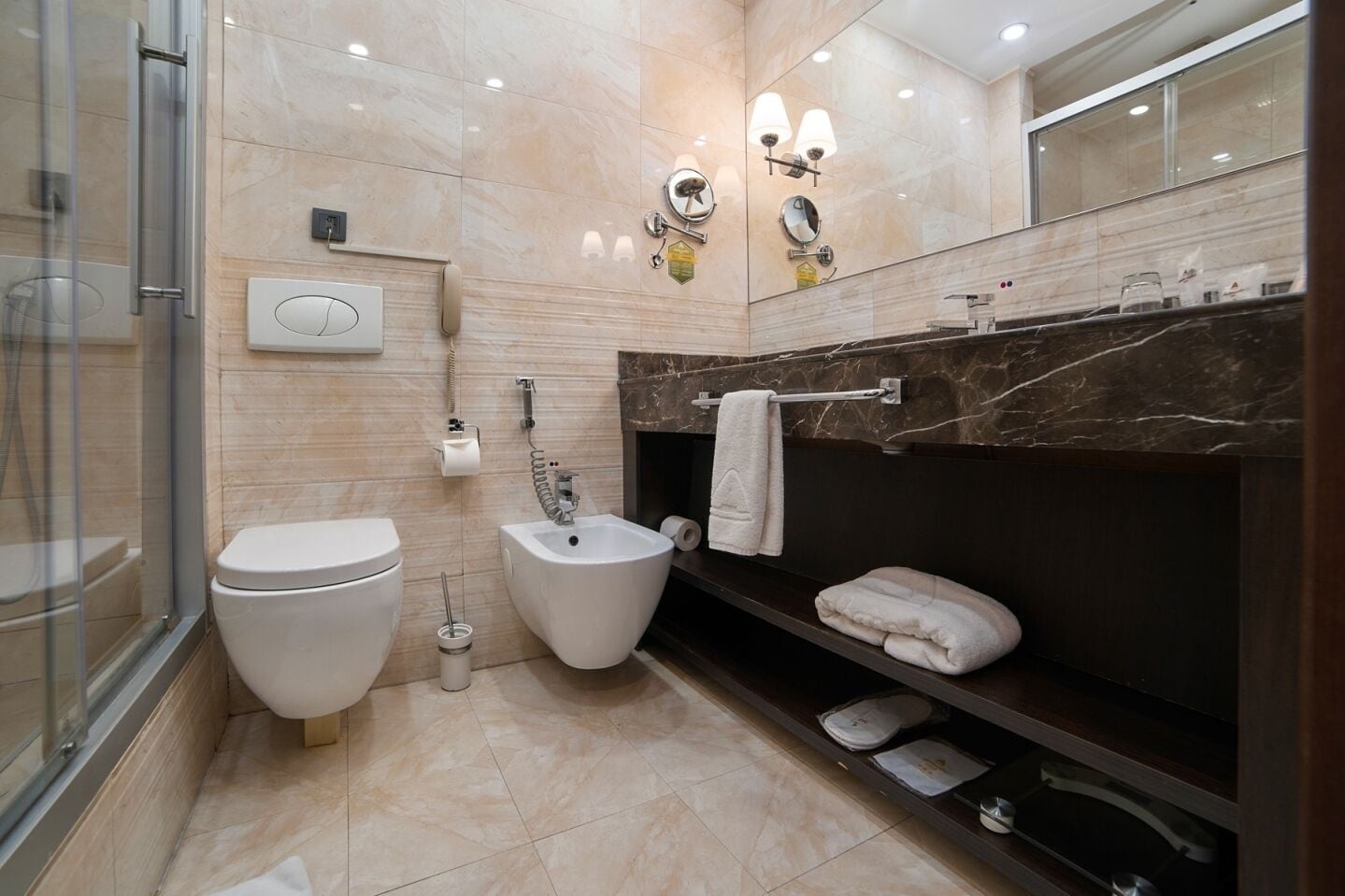 free toiletries, hair dryer, bidet, towels