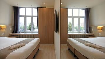 Familie suite, 2 slaapkamers | Een kluis op de kamer, babybedden (toeslag), gratis wifi, beddengoed