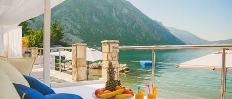 On the beach, sun-loungers, beach umbrellas