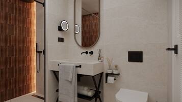 Combined shower/bathtub, free toiletries, hair dryer, bathrobes