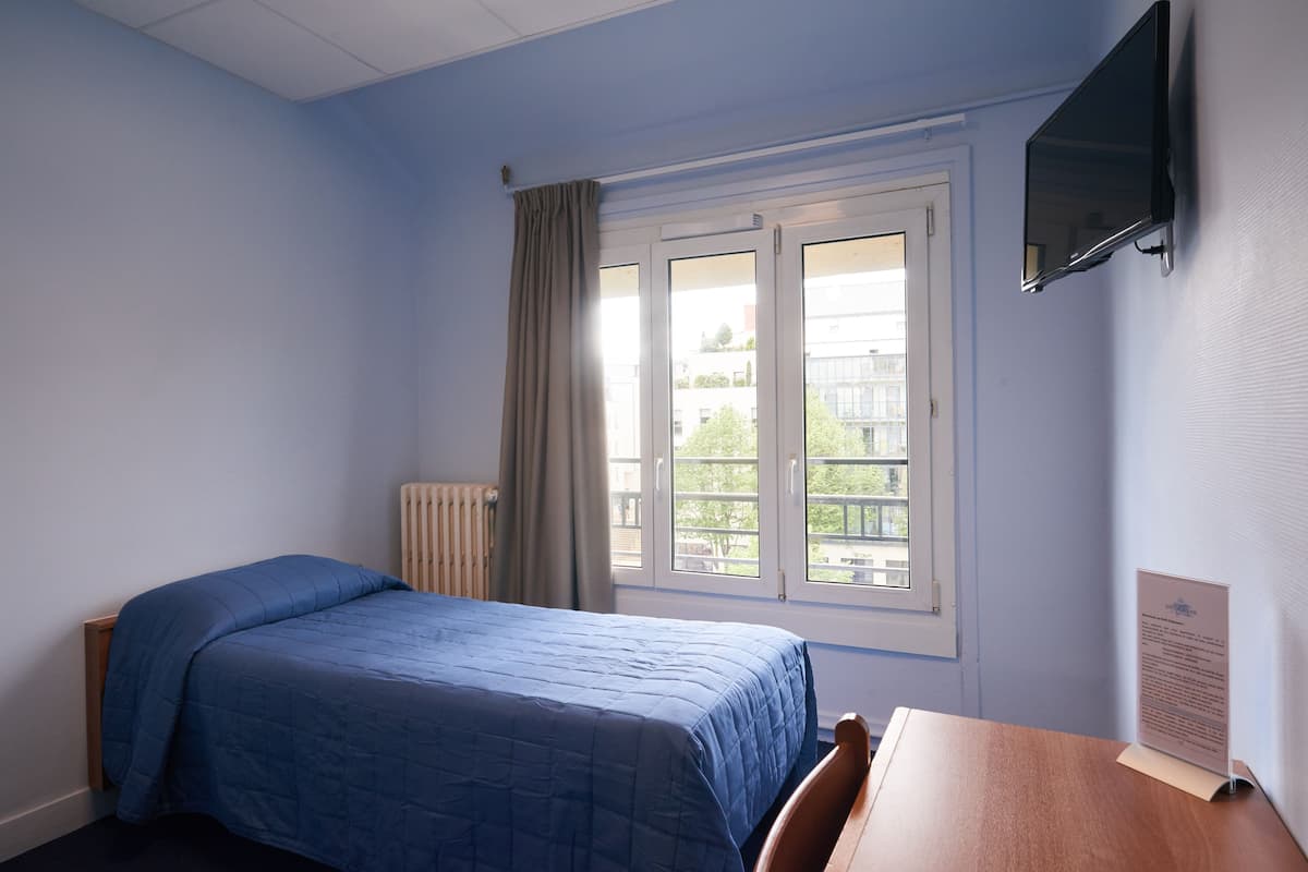 Eenpersoonskamer | Een bureau, geluiddichte muren, gratis wifi, beddengoed