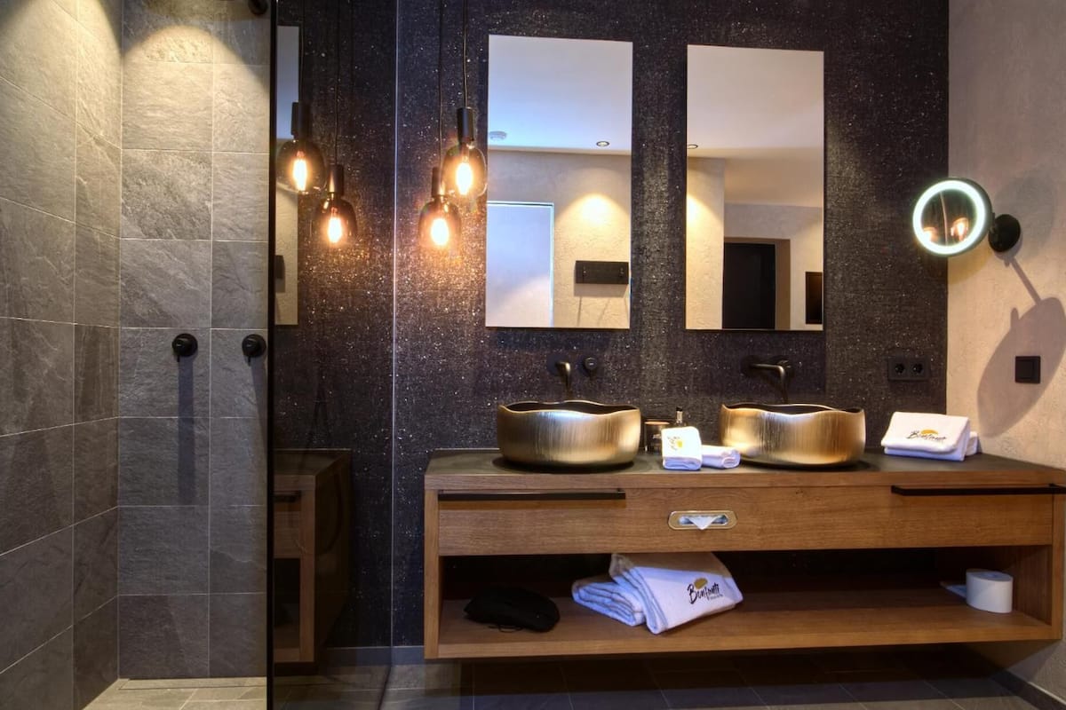 hair dryer, bathrobes, slippers, bidet