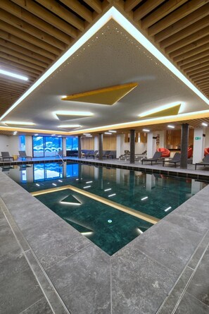 Indoor pool, outdoor pool, open 7:30 AM to 10:00 PM, pool loungers