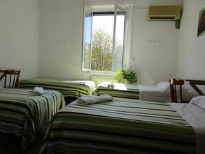 Habitación triple | Ropa de cama