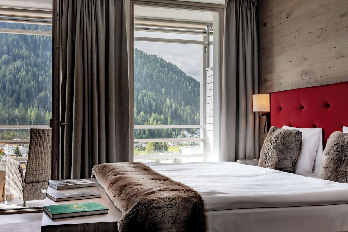 junior suite, mountain view | 1 bedroom, premium bedding, in-room safe, desk