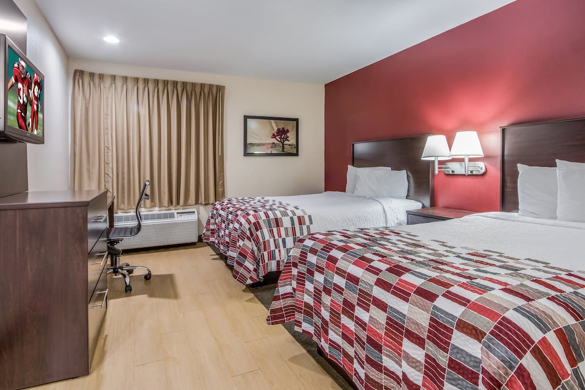 Desk, blackout drapes, free cribs/infant beds, free WiFi