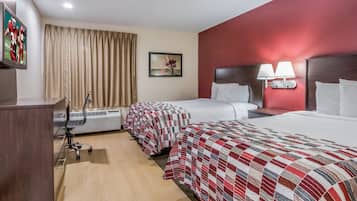 Desk, blackout curtains, free cots/infant beds, free WiFi