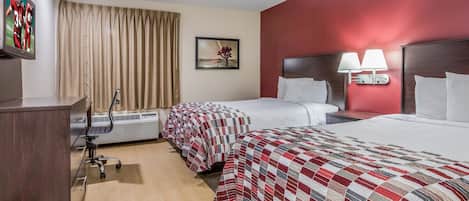 Desk, blackout curtains, free cots/infant beds, free WiFi