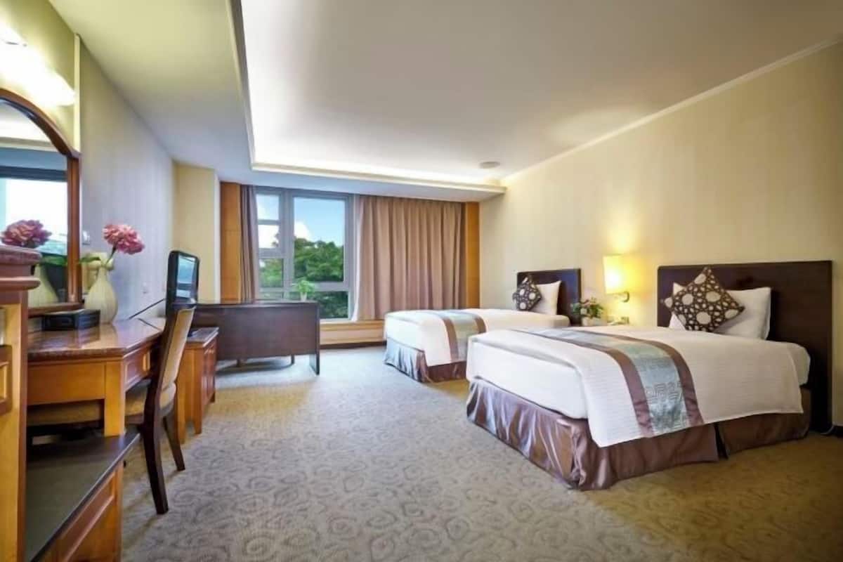 Premium bedding, down duvets, in-room safe, desk