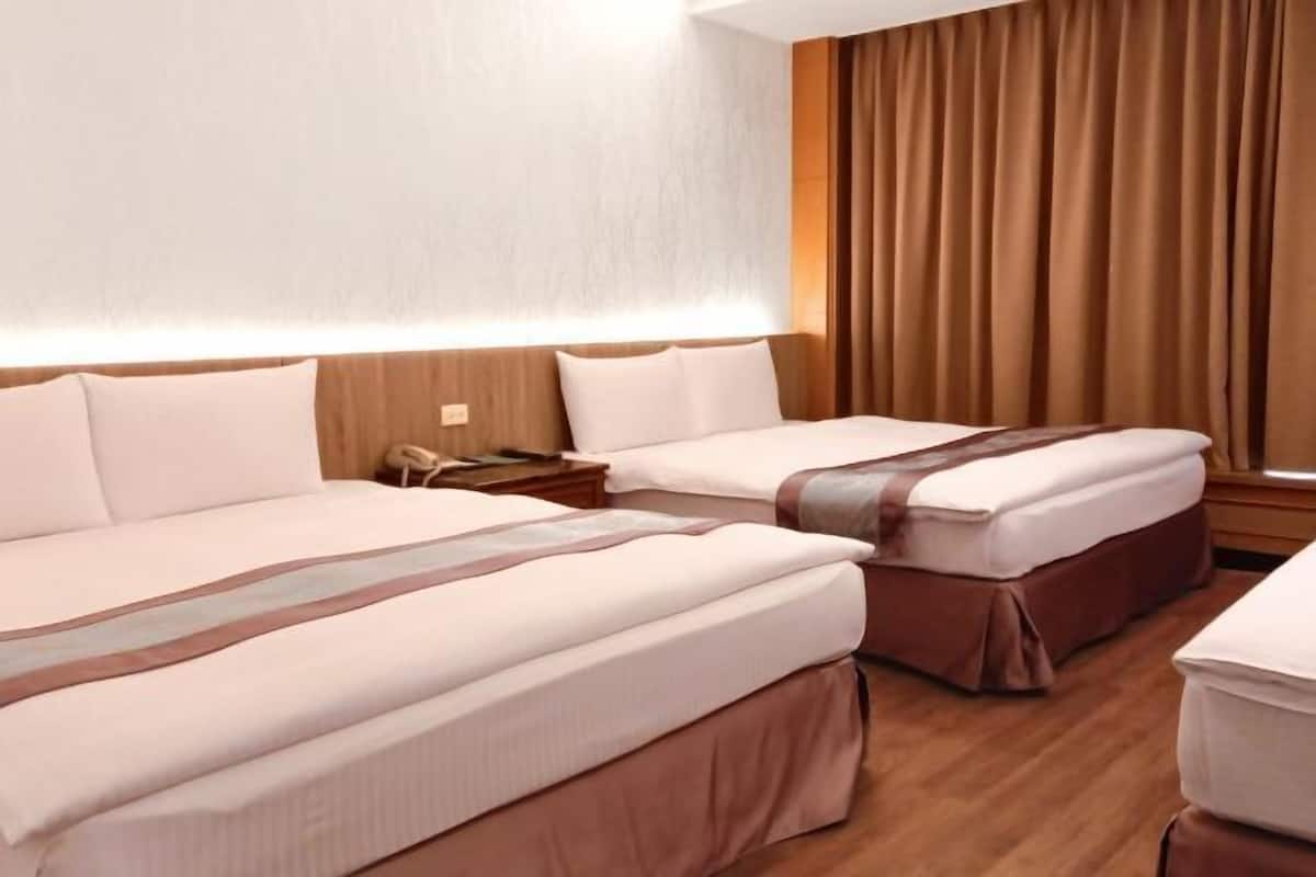 Premium bedding, down duvets, in-room safe, desk