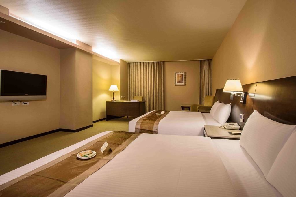 quadruple room | in-room safe, desk, blackout curtains, free wifi