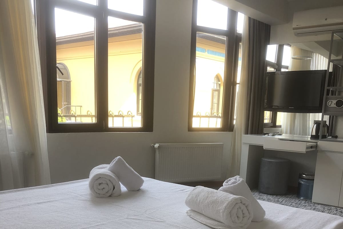 Kamar Deluks | Seprai katun Mesir, seprai premium, dan tempat tidur Select Comfort