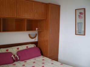 Apartment, 1 Bedroom | 1 bedroom, desk, blackout curtains, iron/ironing board
