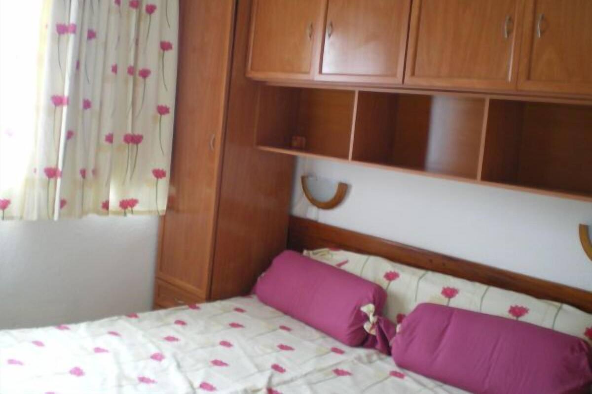 Apartment, 1 Bedroom | 1 bedroom, desk, blackout curtains, iron/ironing board