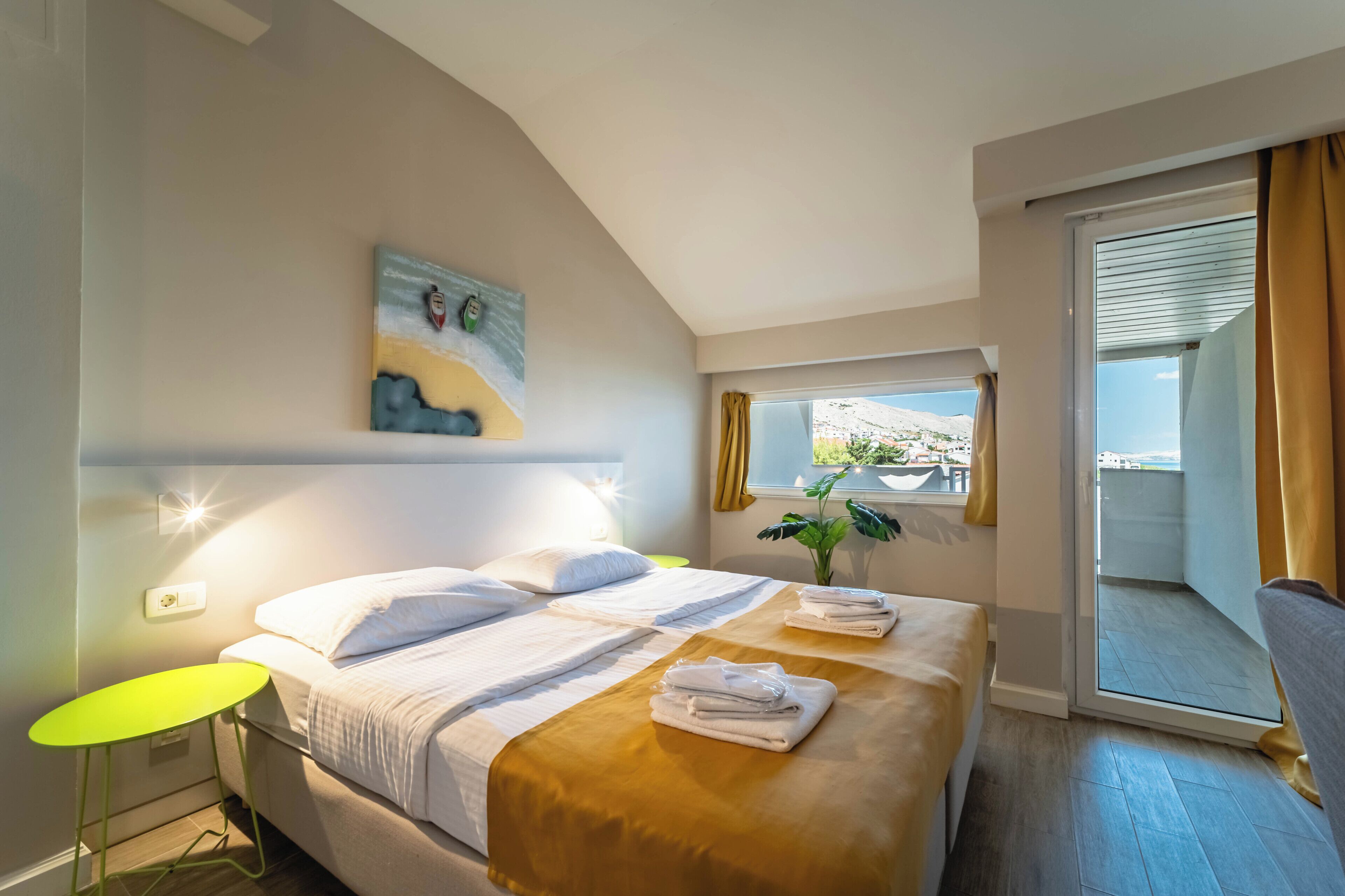 Family Room with Sea View and Balcony | Minibar, in-room safe, desk, laptop workspace