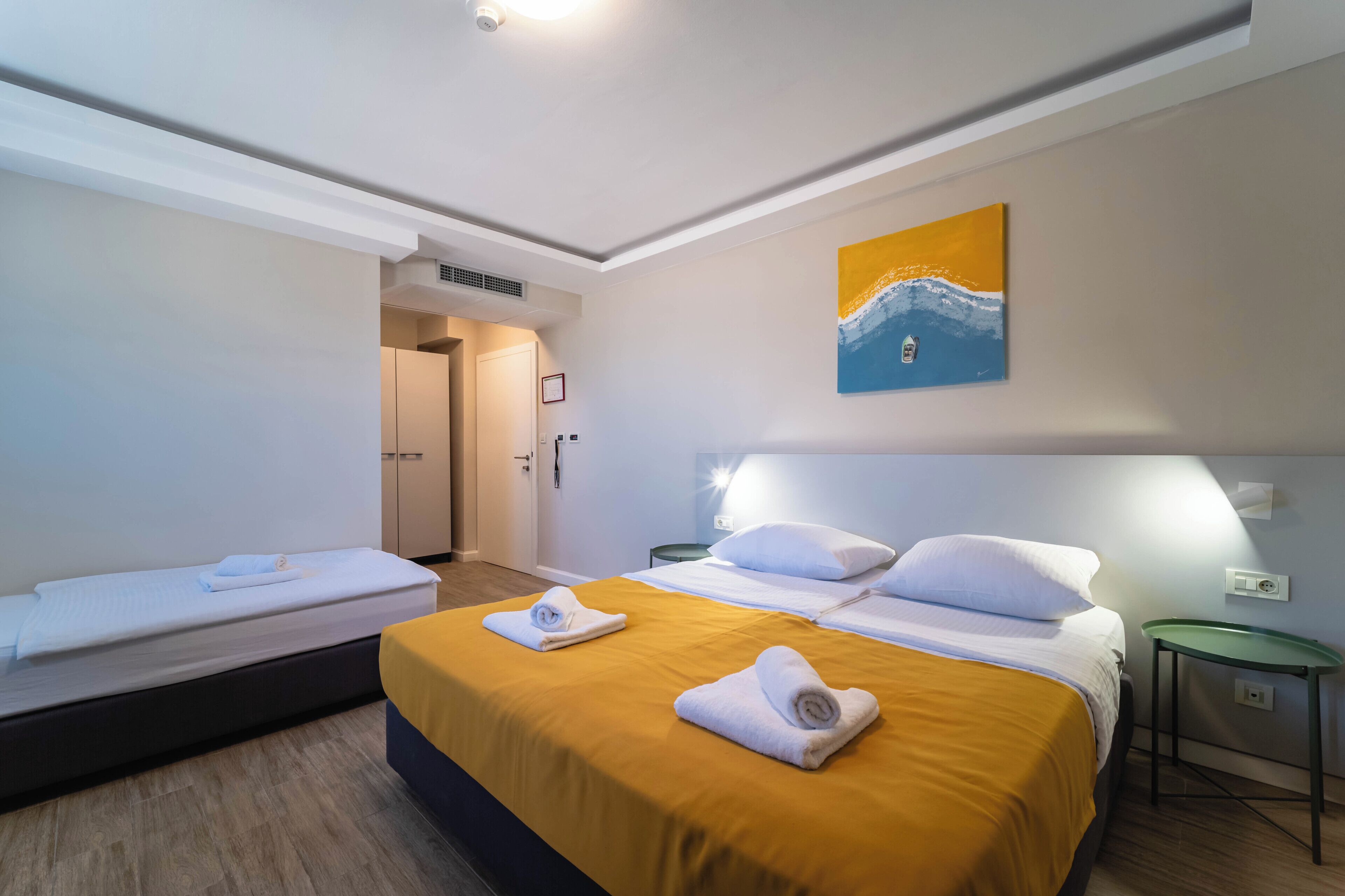Economy triple room (2+1) | Minibar, in-room safe, desk, laptop workspace