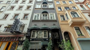 A multi-story building with a central entrance labeled "LAVANTA OTEL". - Lavanta Hotel (Istanbul)