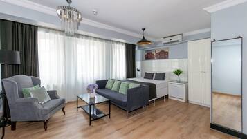 Quarto luxo | 1 quarto, frigobar, Wi-Fi de cortesia, roupa de cama