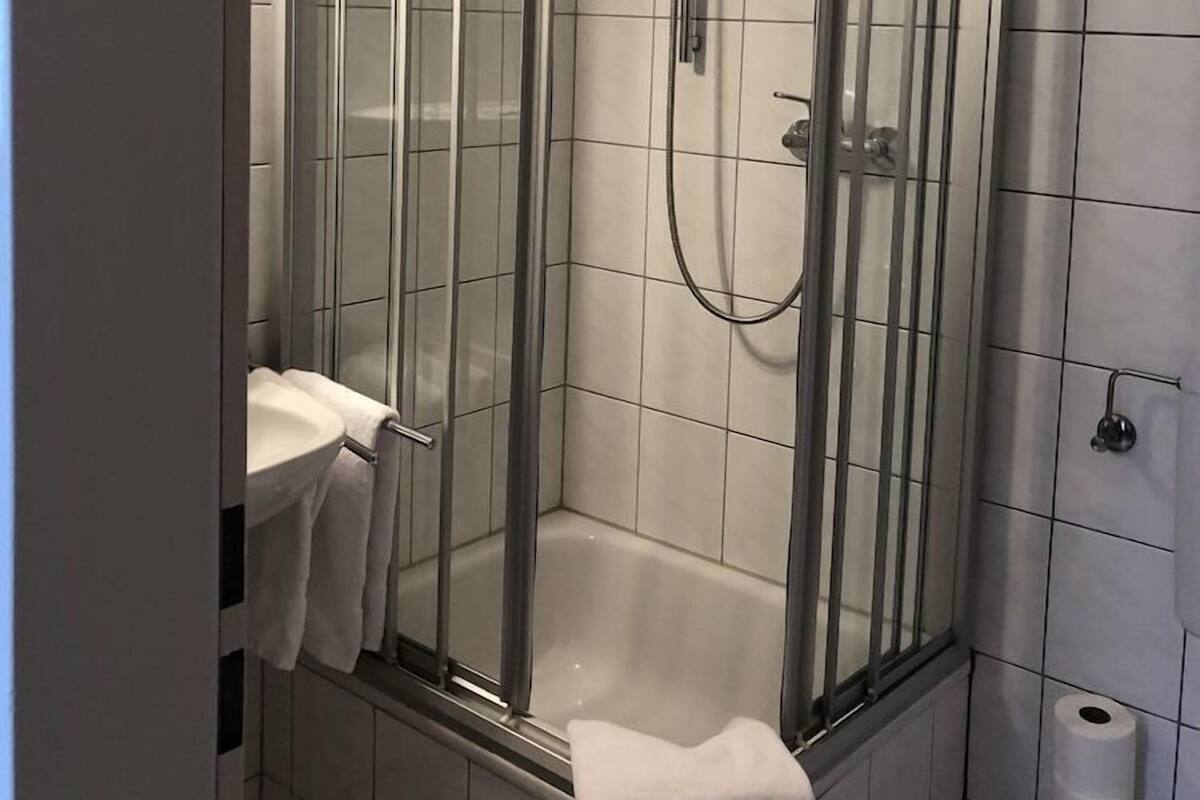Bathroom | Shower, hair dryer, towels