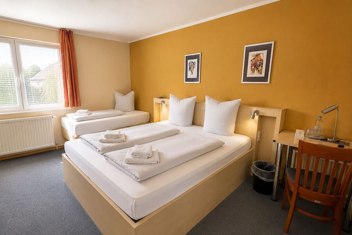 Triple Room, Private Bathroom | Desk, blackout drapes, soundproofing, WiFi (free)