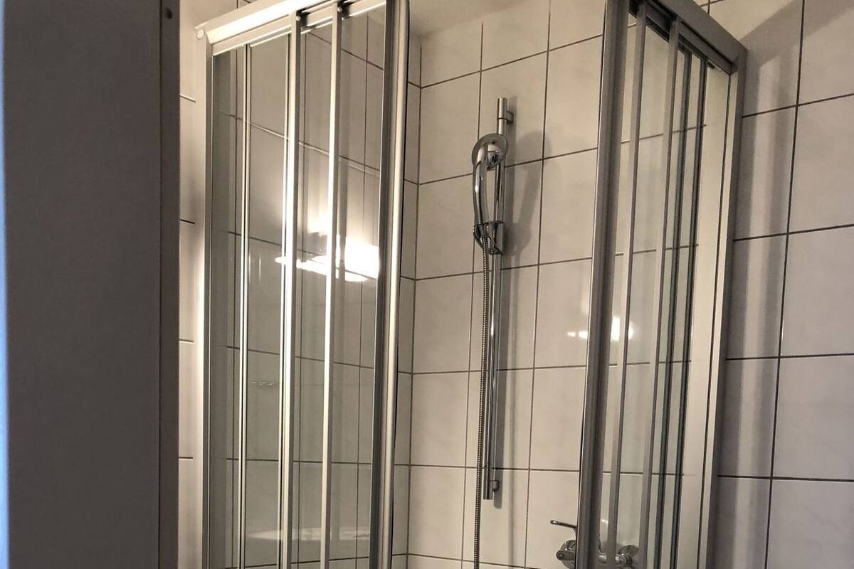 Bathroom | Shower, hair dryer, towels