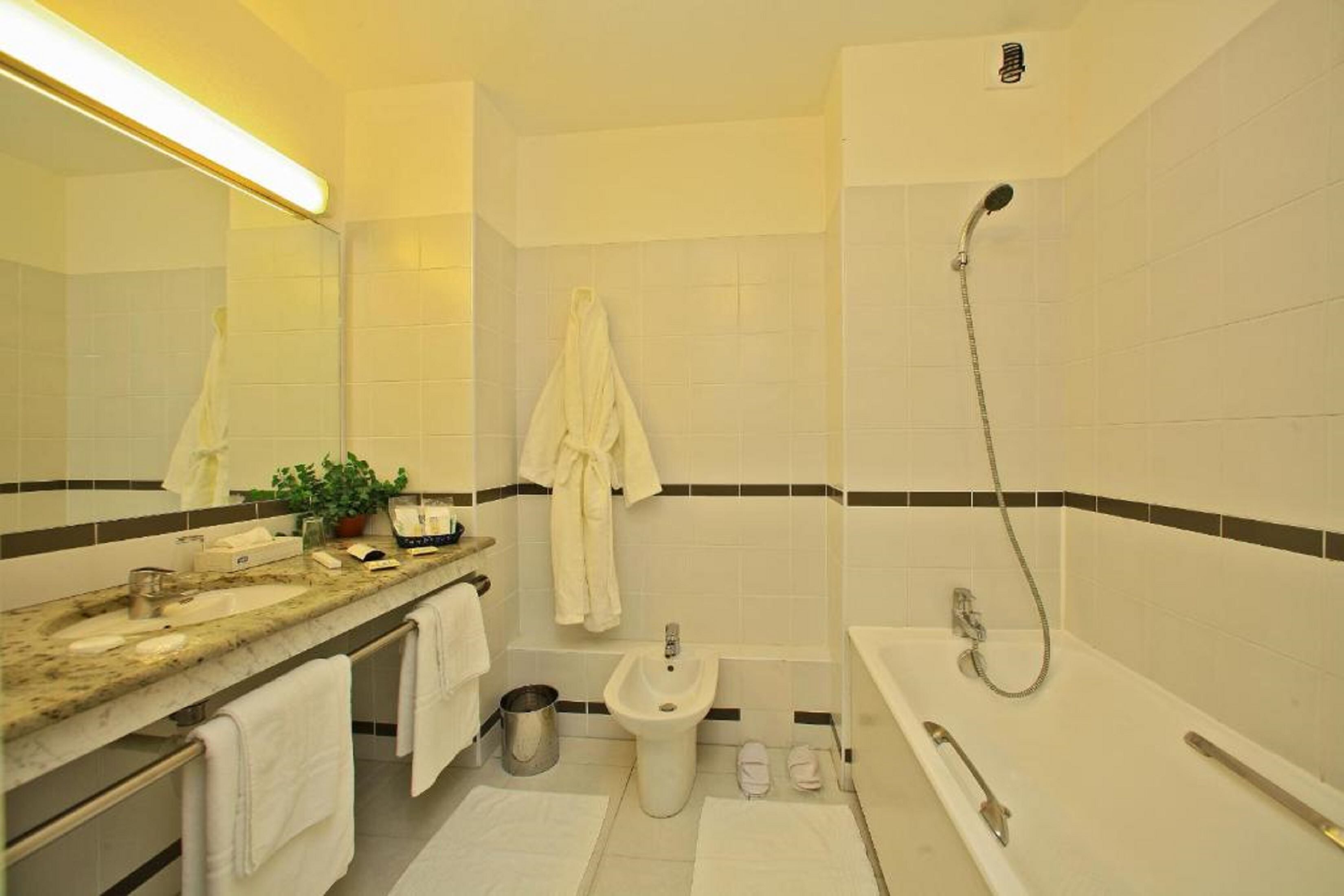 superior twin room | bathroom | free toiletries, hair dryer, towels