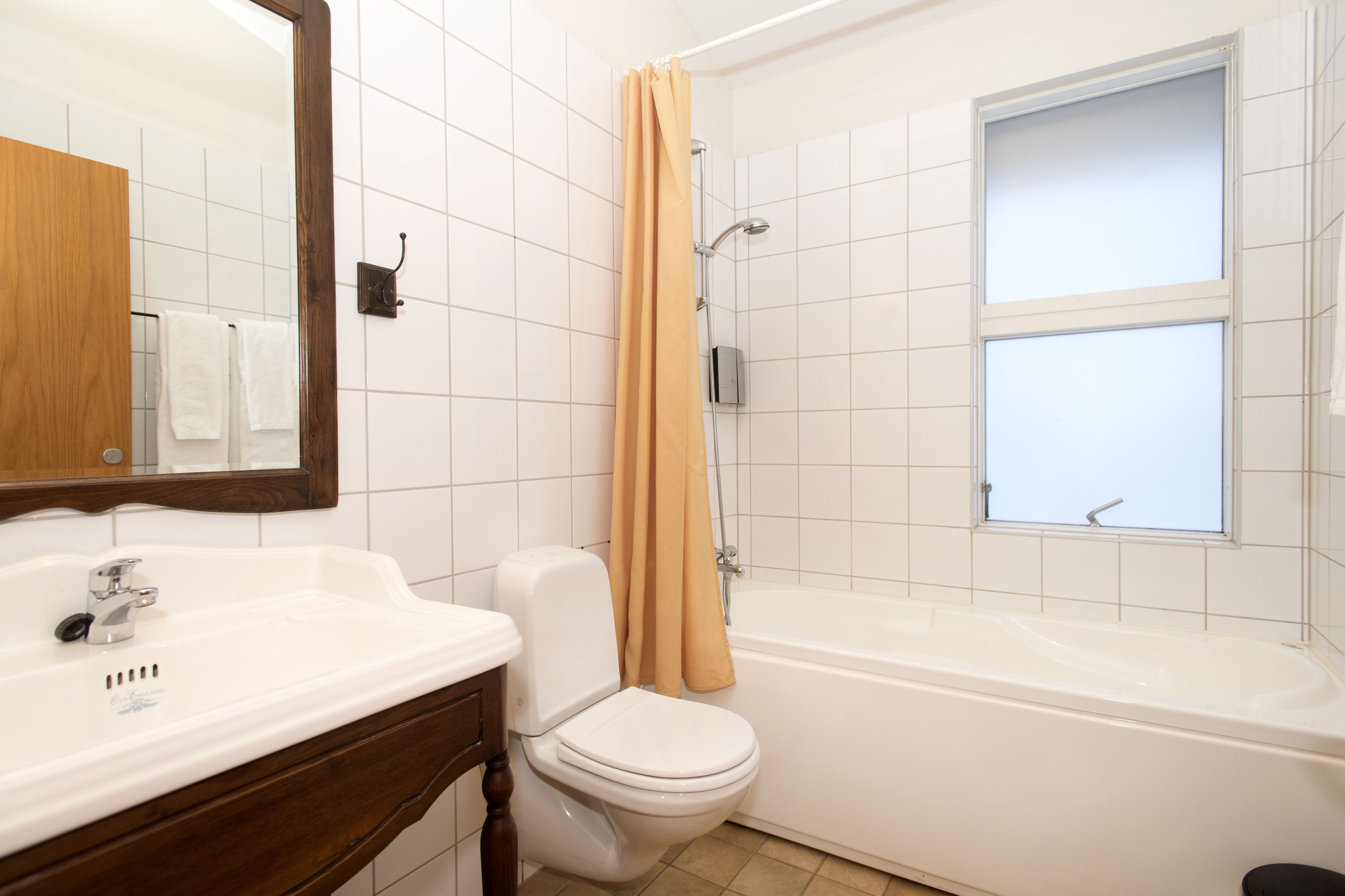 triple room with hot tub access | bathroom | free toiletries, hair dryer, heated floors, towels