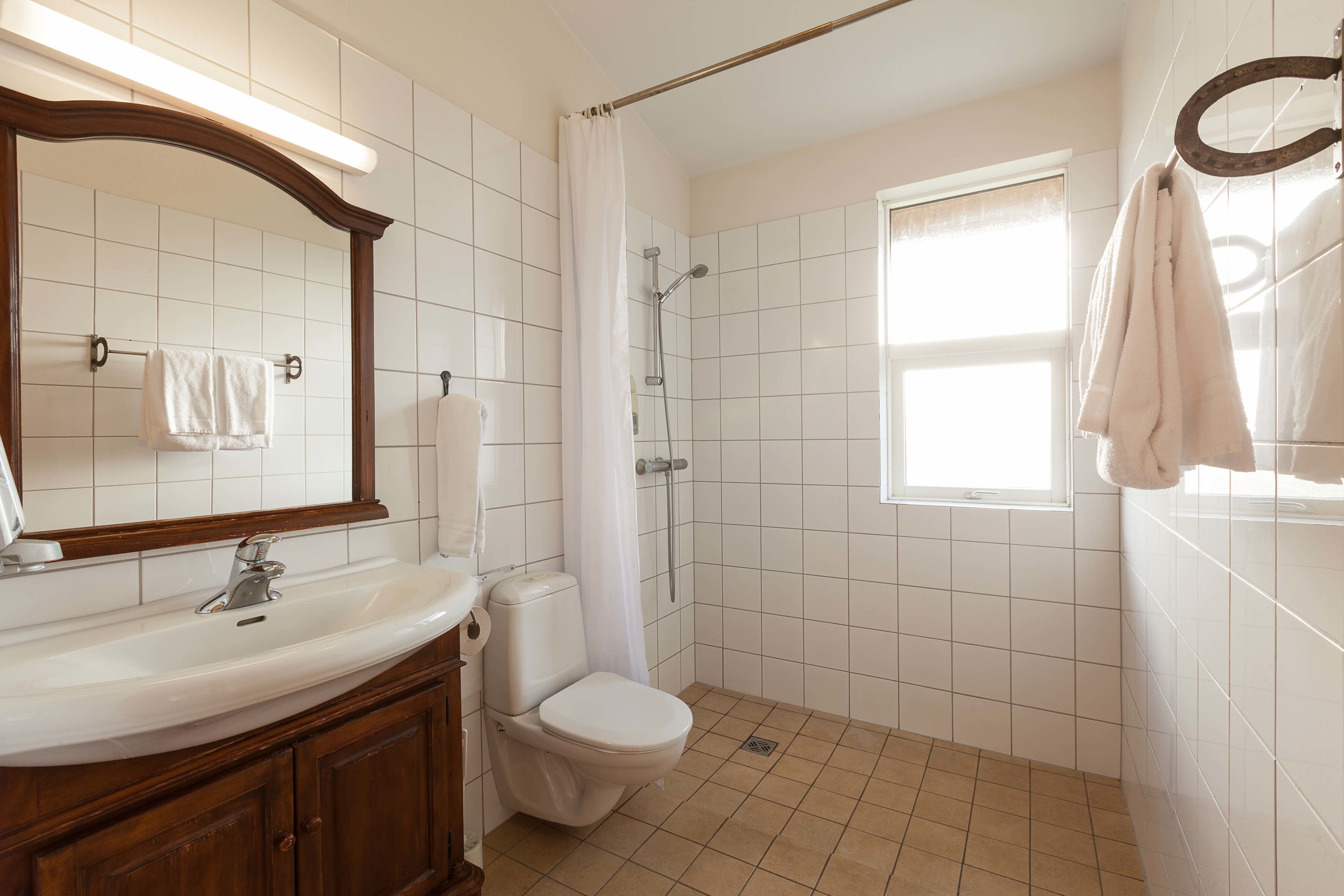 free toiletries, hair dryer, heated floors, towels