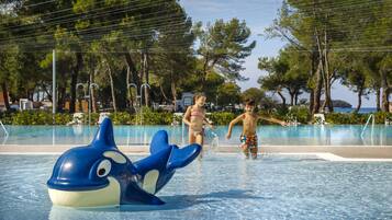 Seasonal outdoor pool, open 9:00 AM to 7:00 PM, sun loungers