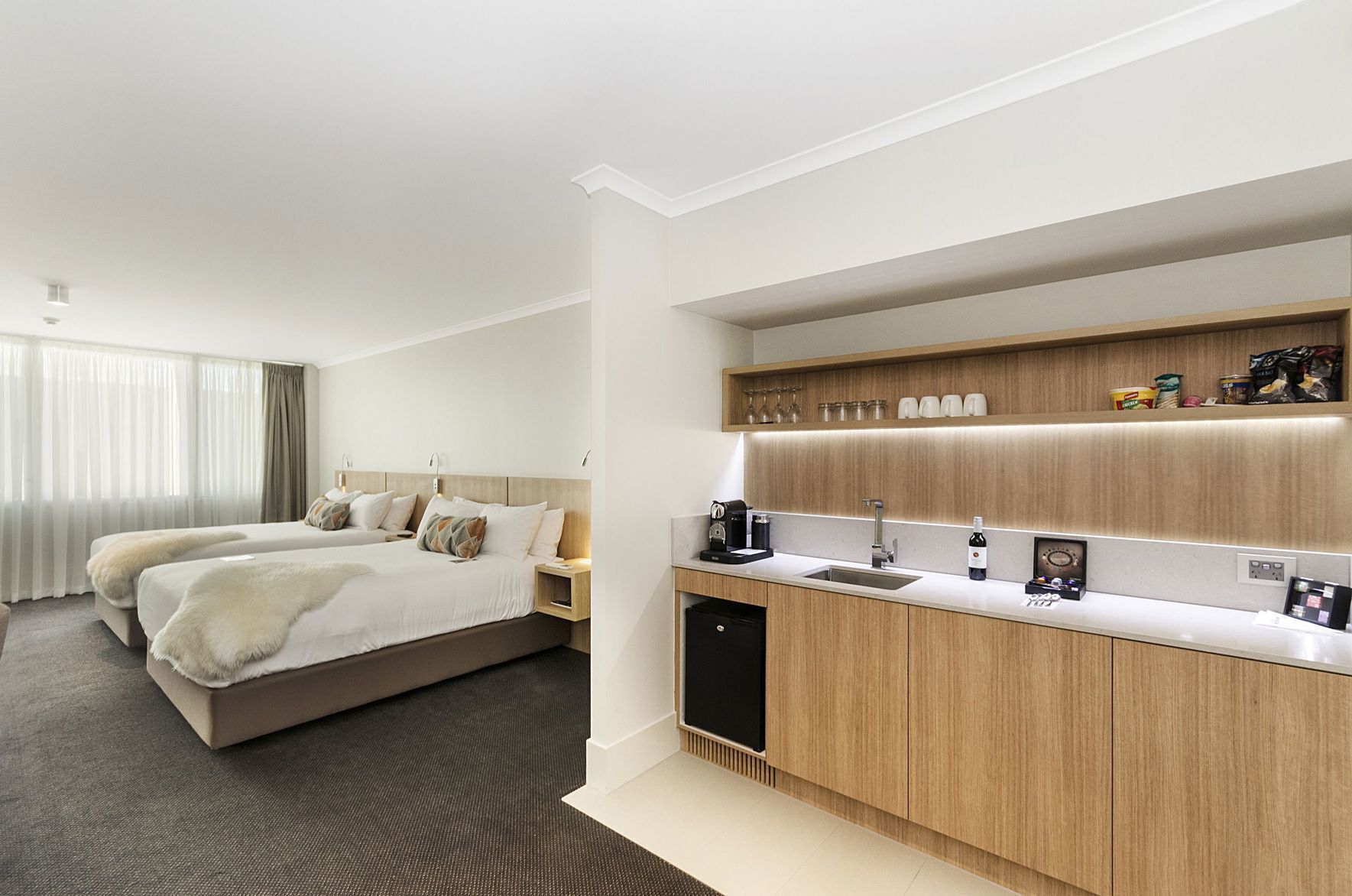 Premium bedding, pillow-top beds, minibar, in-room safe