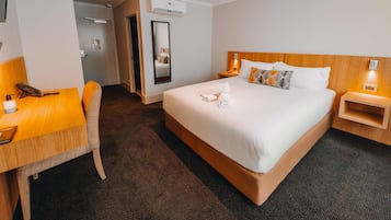 Premium bedding, pillow-top beds, minibar, in-room safe