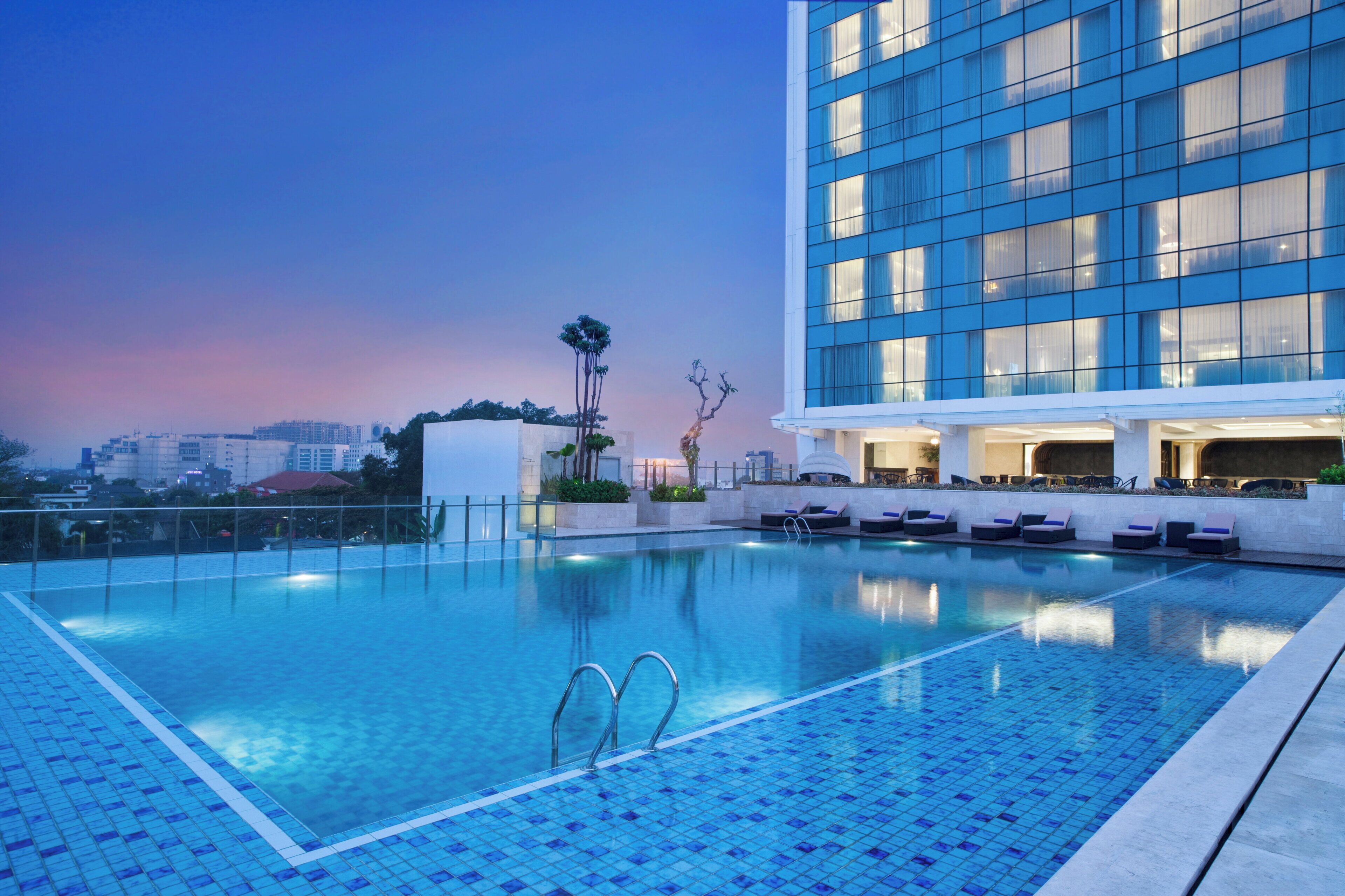 Outdoor pool, open 6:00 AM to 8:00 PM, sun loungers