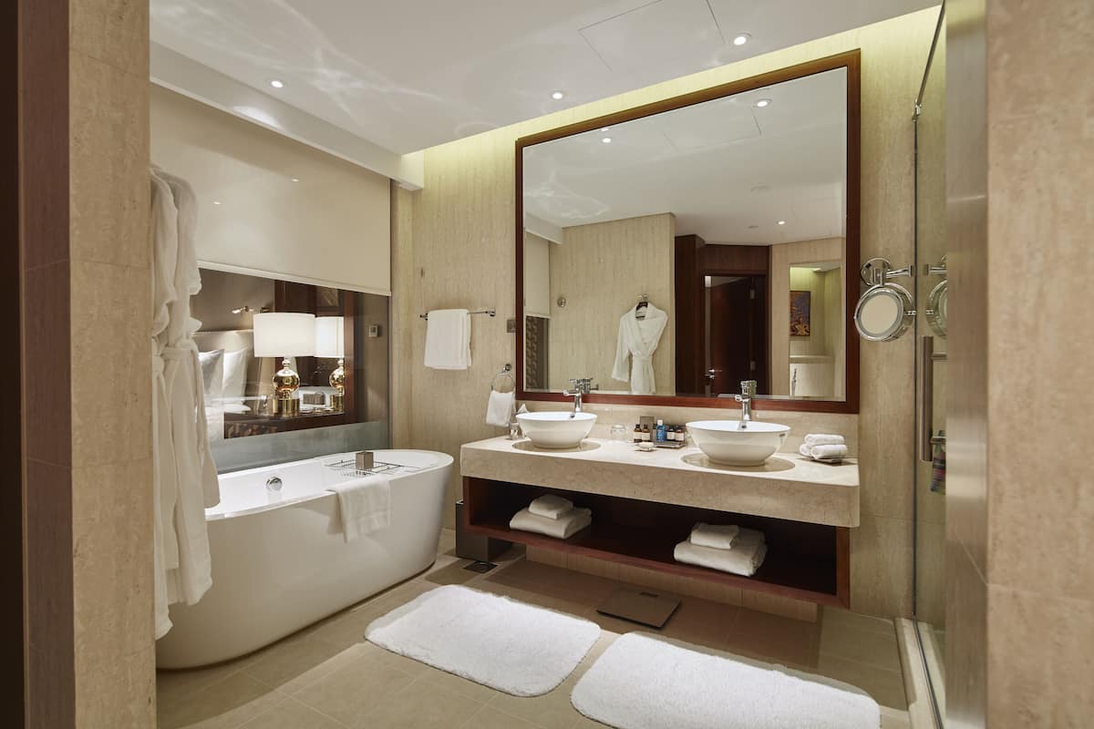 separate bathtub and shower, deep-soaking bathtub, rainfall showerhead