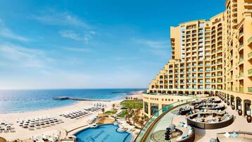 Outdoor pool, open 7 AM to 7 PM, cabanas (surcharge), pool umbrellas