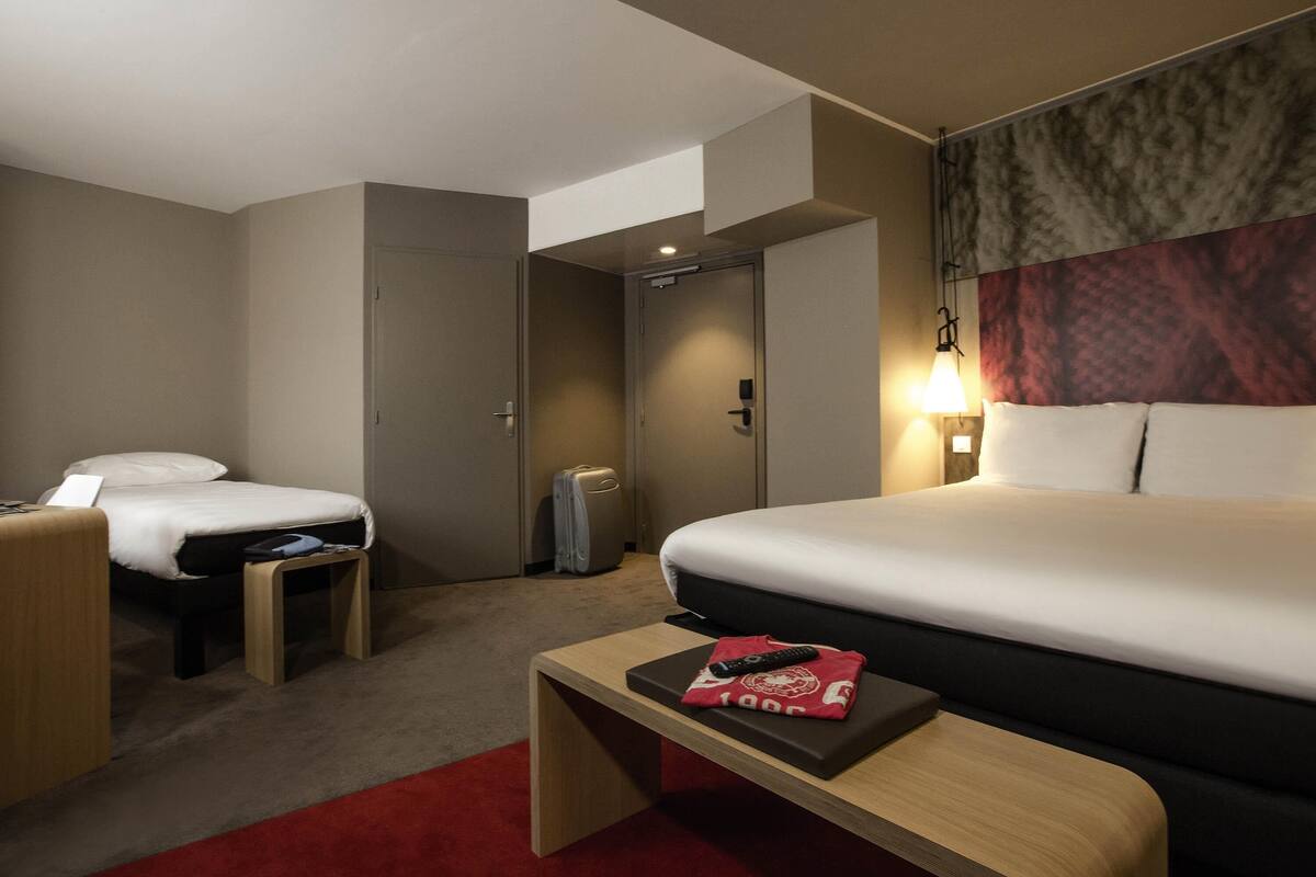 Triple Room, Multiple Beds | In-room safe, desk, soundproofing, cribs (free)