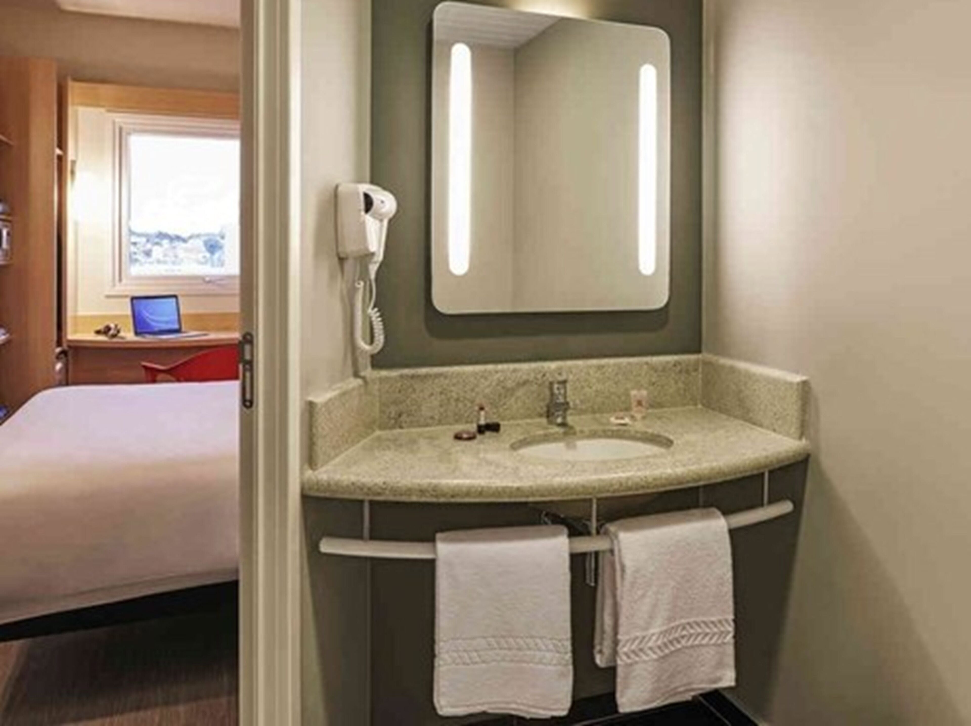 eco-friendly toiletries, hair dryer, towels