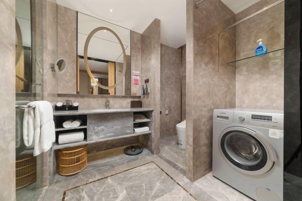 Bathroom | Combined shower/tub, hair dryer, bathrobes, slippers