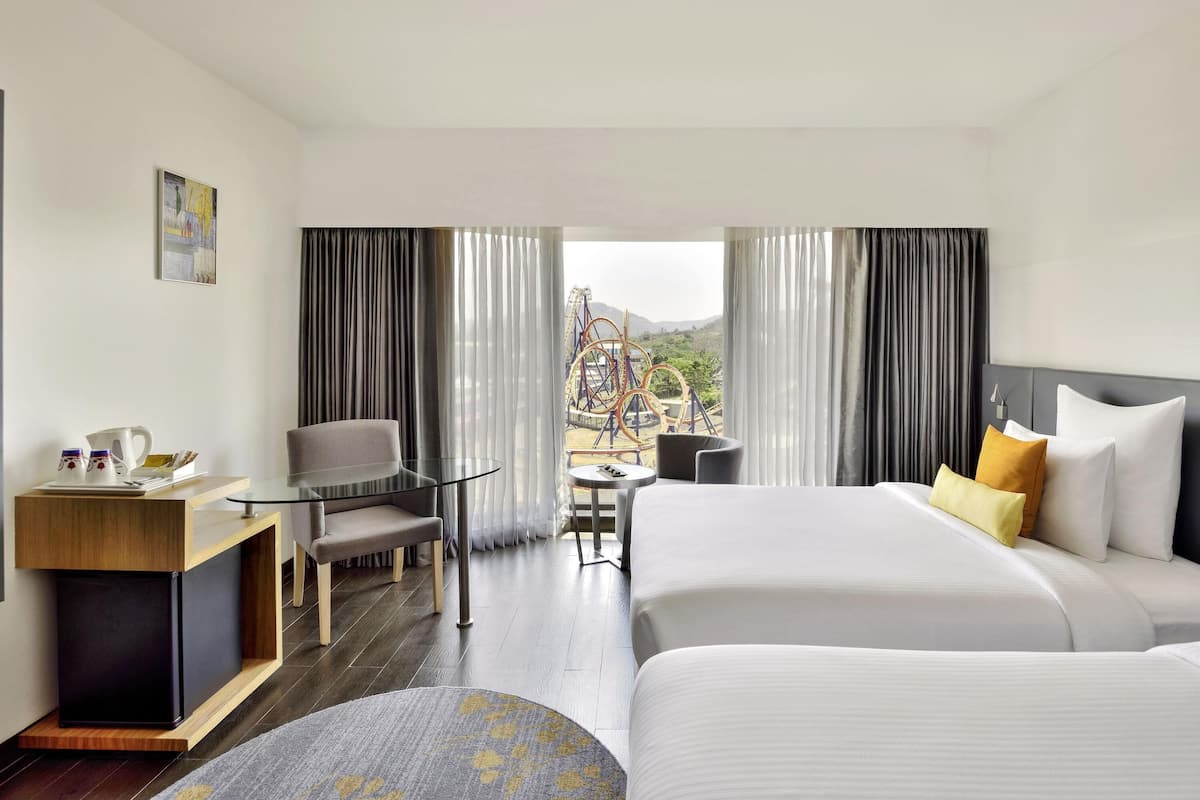 Family Room, 2 Queen Beds (Classic) | Minibar, in-room safe, desk, blackout drapes