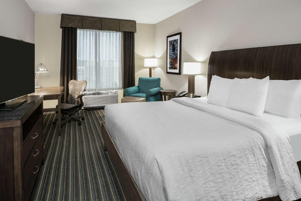 Luxe beddengoed, pillowtop-bedden, een kluis op de kamer, een bureau