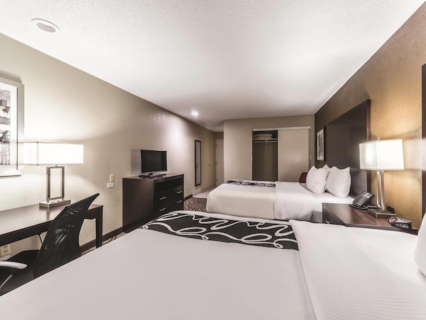 Room, 2 Queen Beds, Non Smoking | Pillow-top beds, desk, blackout curtains, iron/ironing board