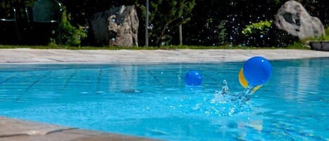 Seasonal outdoor pool, open 8:00 AM to 6:30 PM, sun loungers