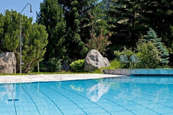 Seasonal outdoor pool, open 8:00 AM to 6:30 PM, sun loungers