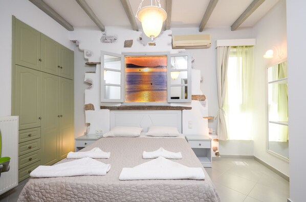 Suite, 2 Bedrooms | Egyptian cotton sheets, premium bedding, pillowtop beds, in-room safe