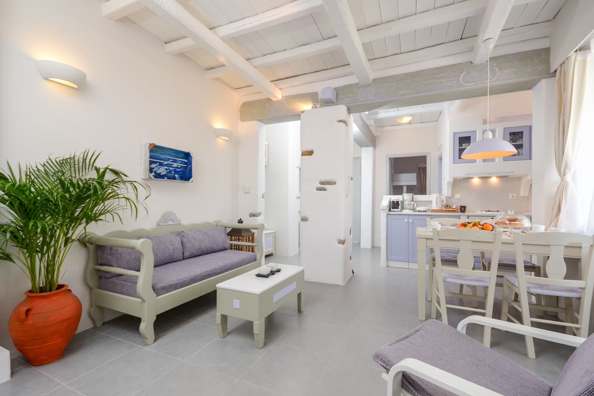 Grand Suite, 2 Bedrooms | Living room | Flat-screen TV, fireplace, DVD player