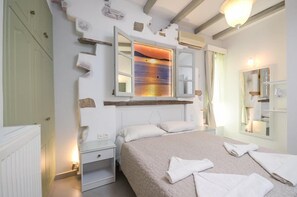 Suite, 2 slaapkamers | Lakens van Egyptisch katoen, luxe beddengoed, pillowtop-bedden