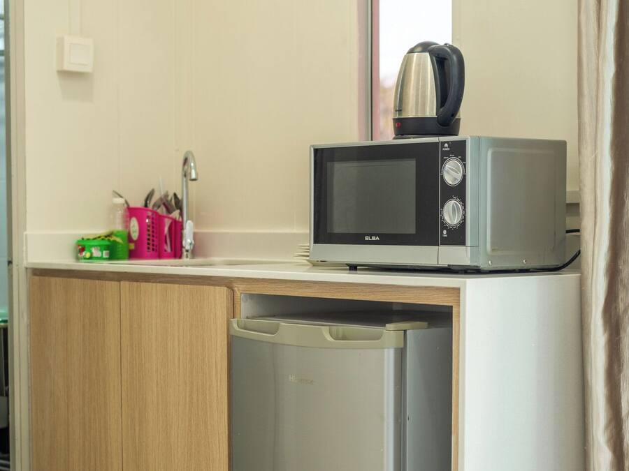 Apartment, 3 Bedrooms | Private kitchen | Fridge, microwave, dishwasher, coffee/tea maker