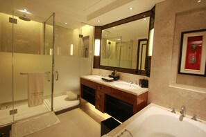 Separate bathtub and shower, jetted bath, rainfall showerhead - The Trans Resort Bali (Seminyak)