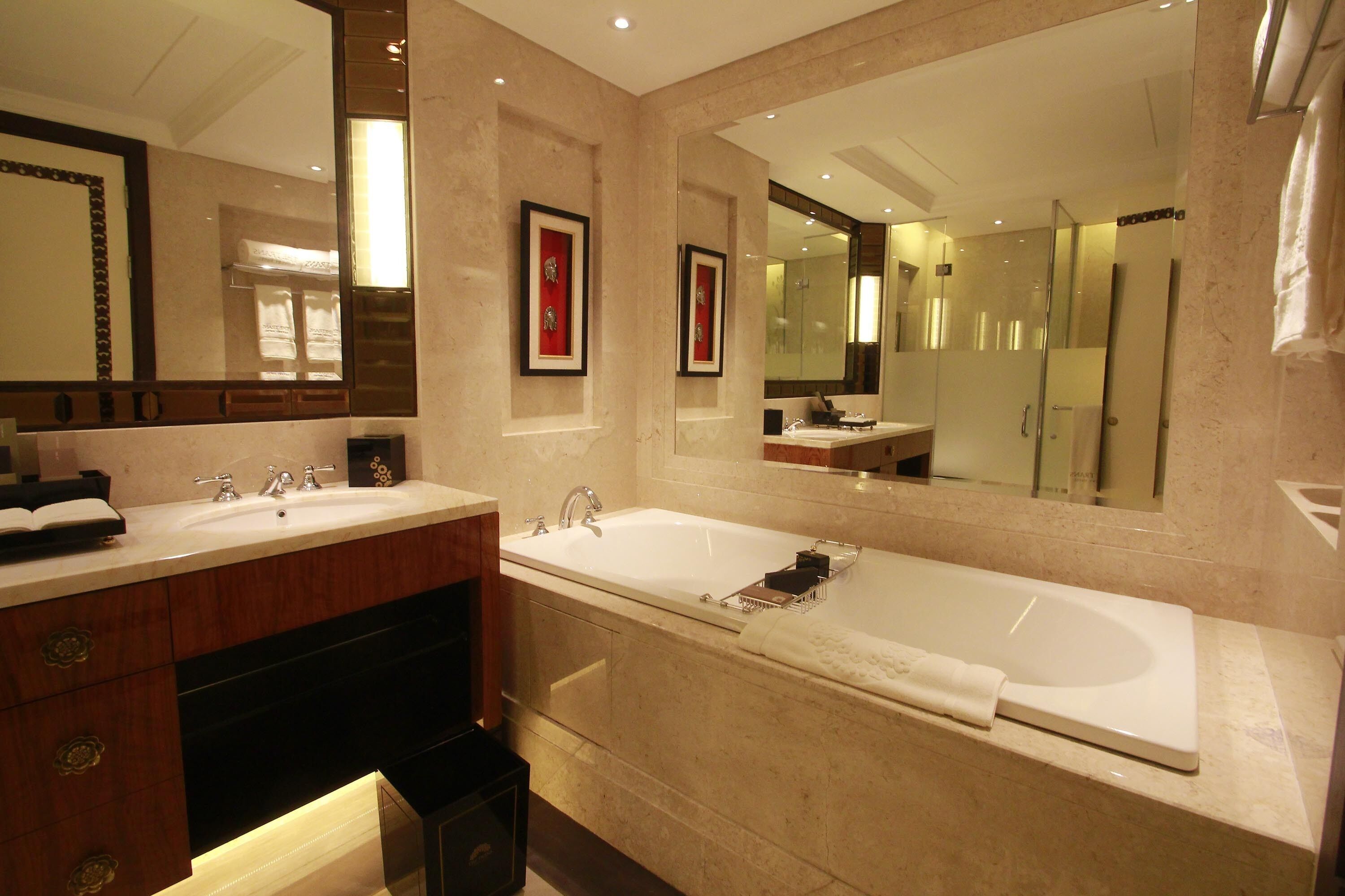 separate bathtub and shower, jetted bath, rainfall showerhead