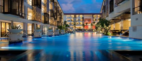 Outdoor pool, open 7:00 AM to 7:00 PM, pool umbrellas, pool loungers