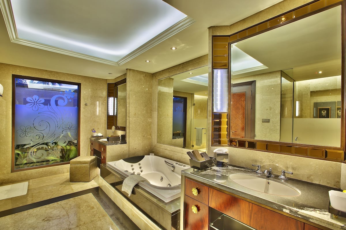 one bedroom pool villa | bathroom | separate bathtub and shower, jetted bath, rainfall showerhead